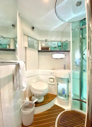 Mahalo Yacht Photos Pics Luxurious 2007 Fairline Targa 52 yacht bathroom with modern fixtures and elegant design.