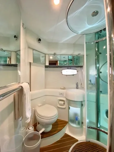 Mahalo Yacht Photos Pics Luxurious bathroom in 2007 Fairline Targa 52 yacht with modern fixtures and elegant design.