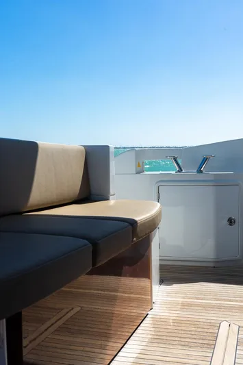 Seanner Yacht Photos Pics Azimut 45 Flybridge 2014 yacht deck with seating and ocean view.