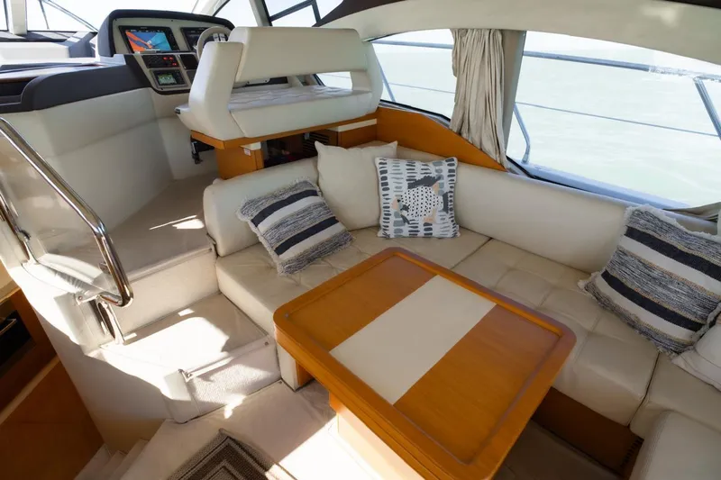 Seanner Yacht Photos Pics Luxurious interior of 2014 Azimut 45 Flybridge yacht with plush seating and elegant decor.