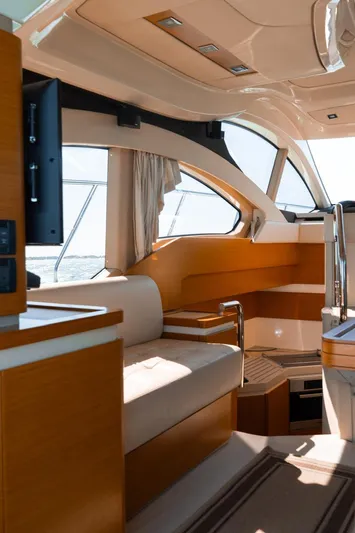 Seanner Yacht Photos Pics Luxurious interior of a 2014 Azimut 45 Flybridge yacht with elegant seating and modern design.