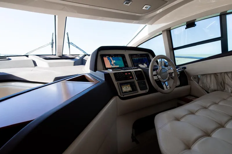 Seanner Yacht Photos Pics Luxurious interior of 2014 Azimut 45 Flybridge yacht cockpit with modern navigation controls.