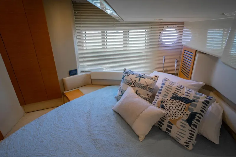 Seanner Yacht Photos Pics Luxurious bedroom interior of 2014 Azimut 45 Flybridge yacht with decorative pillows.