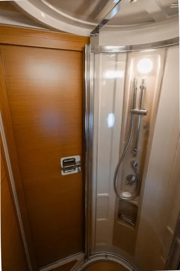 Seanner Yacht Photos Pics Shower area in 2014 Azimut 45 Flybridge yacht, featuring modern fixtures and wooden accents.