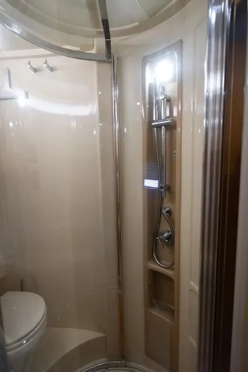 Seanner Yacht Photos Pics Luxurious bathroom in 2014 Azimut 45 Flybridge yacht, featuring modern shower and sleek design.