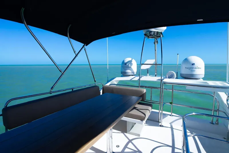 Seanner Yacht Photos Pics Flybridge view of 2014 Azimut 45 yacht with ocean backdrop.