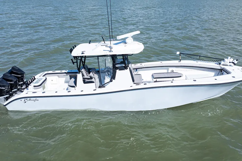  Yacht Photos Pics 2019 Yellowfin 36 Offshore boat on water, featuring sleek design and powerful engines.