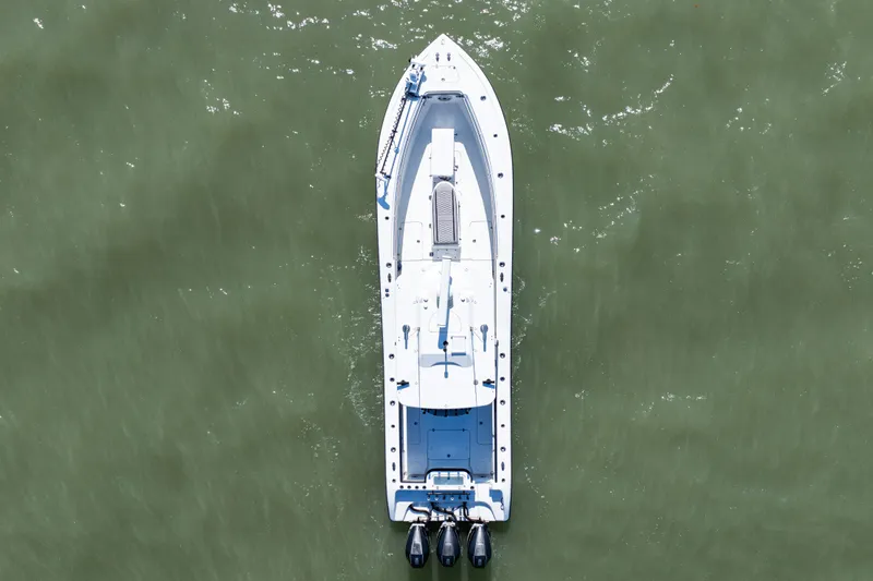  Yacht Photos Pics Aerial view of 2019 Yellowfin 36 Offshore boat on green water.