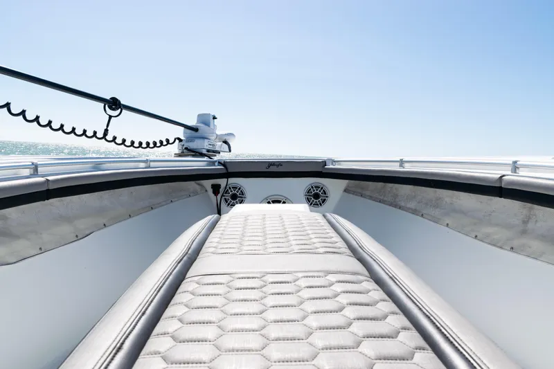  Yacht Photos Pics 2019 Yellowfin 36 Offshore boat interior with cushioned seating and ocean view.