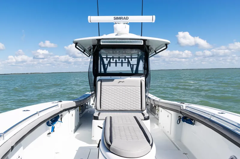  Yacht Photos Pics 2019 Yellowfin 36 Offshore boat on open water, featuring sleek design and comfortable seating.