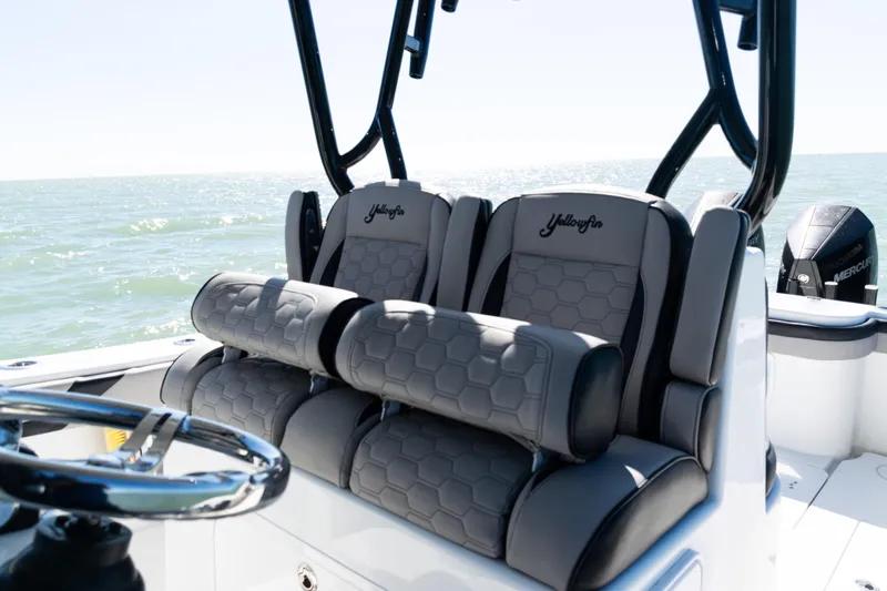  Yacht Photos Pics 2019 Yellowfin 36 Offshore boat interior with cushioned seating and ocean view.
