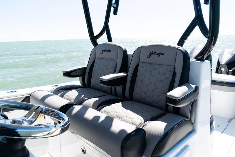  Yacht Photos Pics 2019 Yellowfin 36 Offshore boat seats with ocean view, featuring sleek design and comfort.