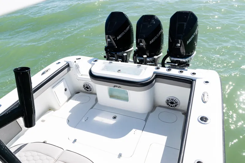  Yacht Photos Pics 2019 Yellowfin 36 Offshore boat with triple Mercury engines on open water.