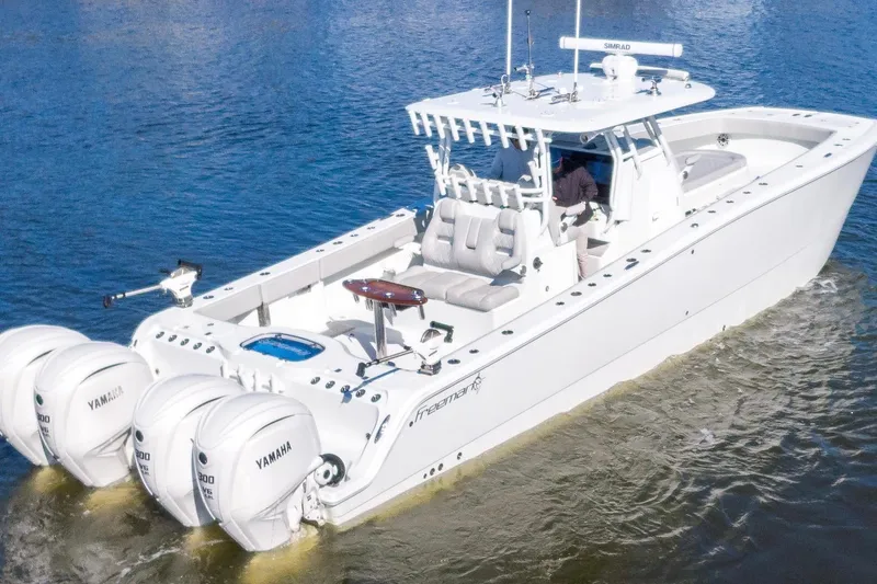  Yacht Photos Pics 2024 Freeman 38 boat with Yamaha engines cruising on water.