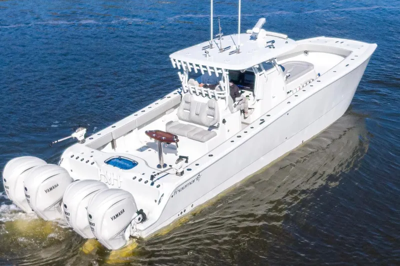  Yacht Photos Pics 2024 Freeman 38 boat with Yamaha engines cruising on water.