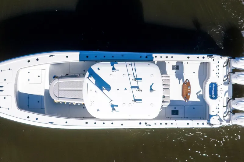  Yacht Photos Pics Aerial view of 2024 Freeman 38 boat on water, showcasing sleek design and powerful engines.