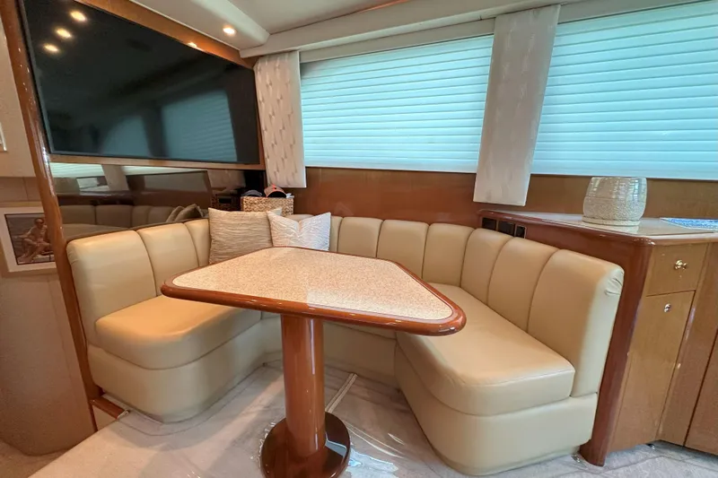 Journey Yacht Photos Pics Luxurious interior of 2003 Viking 48 Convertible yacht with plush seating and elegant decor.