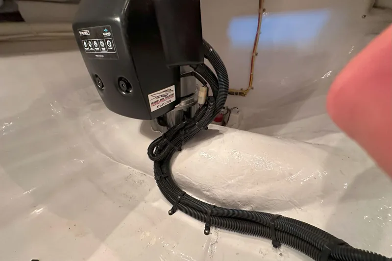 Journey Yacht Photos Pics Engine room of 2003 Viking 48 Convertible with visible wiring and equipment.