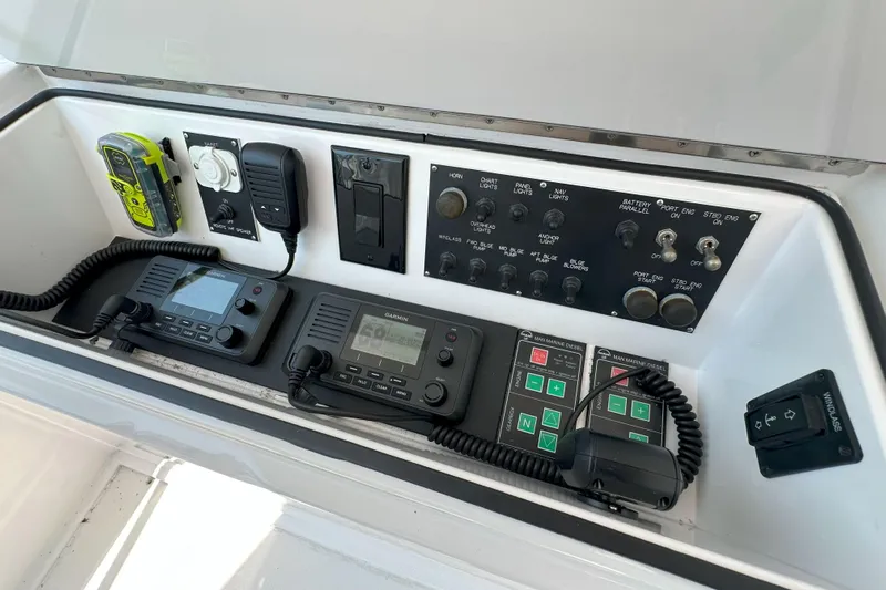 Journey Yacht Photos Pics Control panel of a 2003 Viking 48 Convertible boat with navigation and communication equipment.