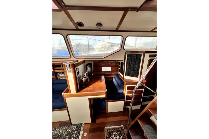  Yacht Photos Pics Interior of 2014 Custom Aluminum Expedition yacht with wood and blue upholstery.