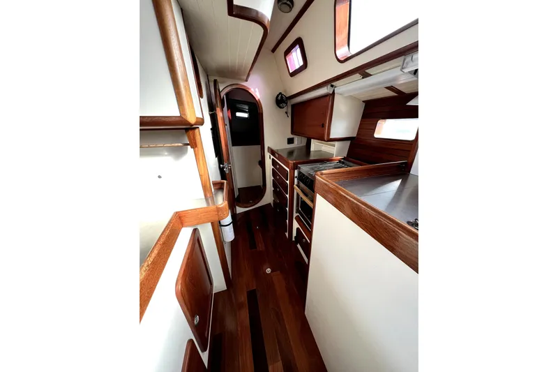  Yacht Photos Pics Interior of 2014 Custom Aluminum Expedition yacht with wood accents and modern kitchen.