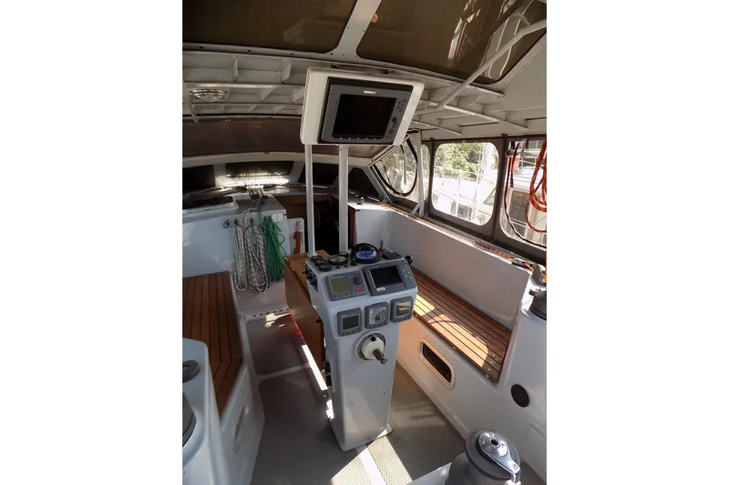  Yacht Photos Pics Interior of 2014 Custom Aluminum Expedition boat with navigation equipment and seating.