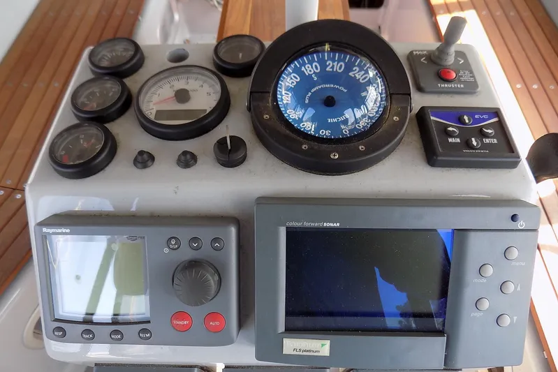  Yacht Photos Pics Control panel of 2014 Custom Aluminum Expedition boat with navigation instruments and sonar display.