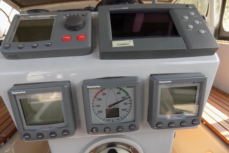  Yacht Photos Pics Control panel of a 2014 Custom Aluminum Expedition boat with Raymarine instruments.