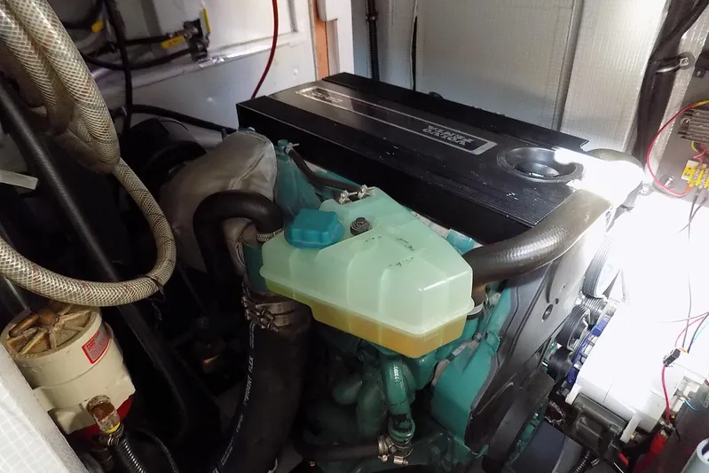  Yacht Photos Pics Engine compartment of a 2014 Custom Aluminum Expedition boat, showcasing detailed components.