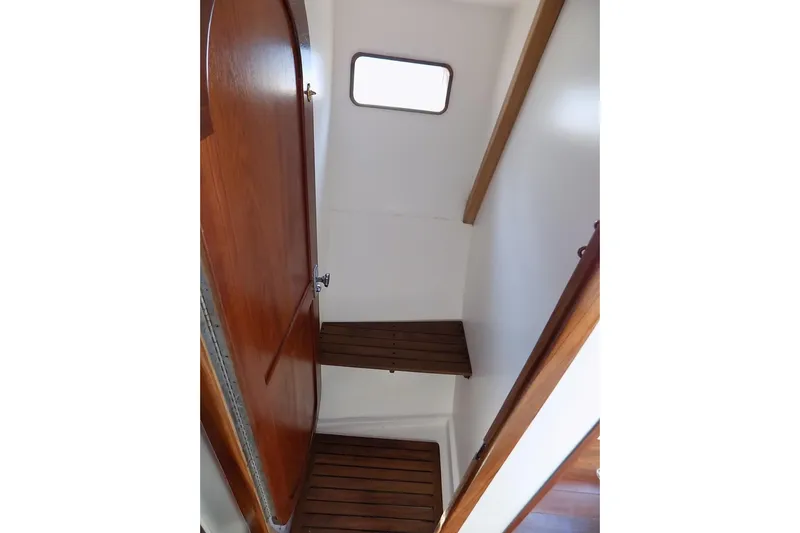  Yacht Photos Pics Interior of 2014 Custom Aluminum Expedition boat with wooden steps and door.
