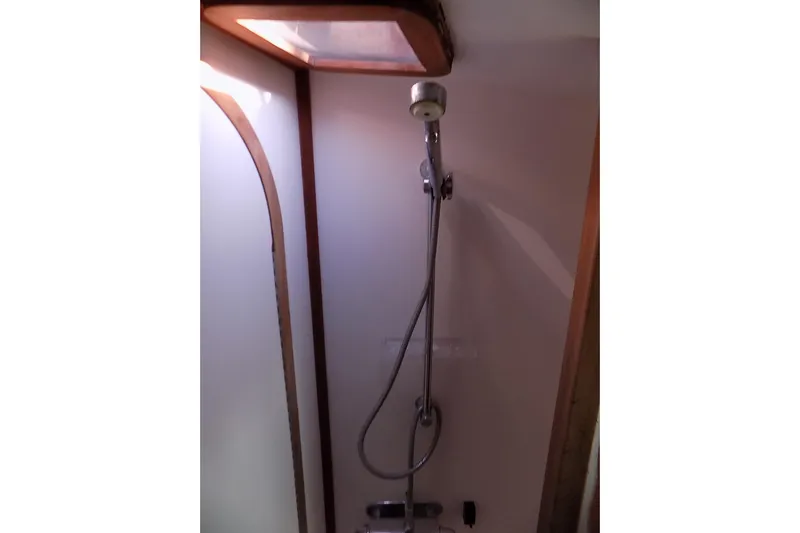  Yacht Photos Pics Shower area in 2014 Custom Aluminum Expedition boat, featuring a handheld showerhead.