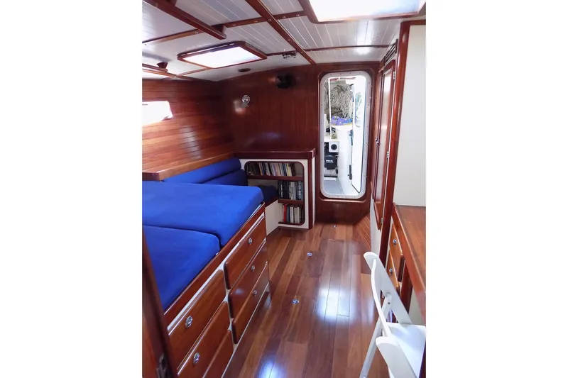  Yacht Photos Pics Luxurious 2014 Custom Aluminum Expedition yacht interior with wooden finish and blue bedding.