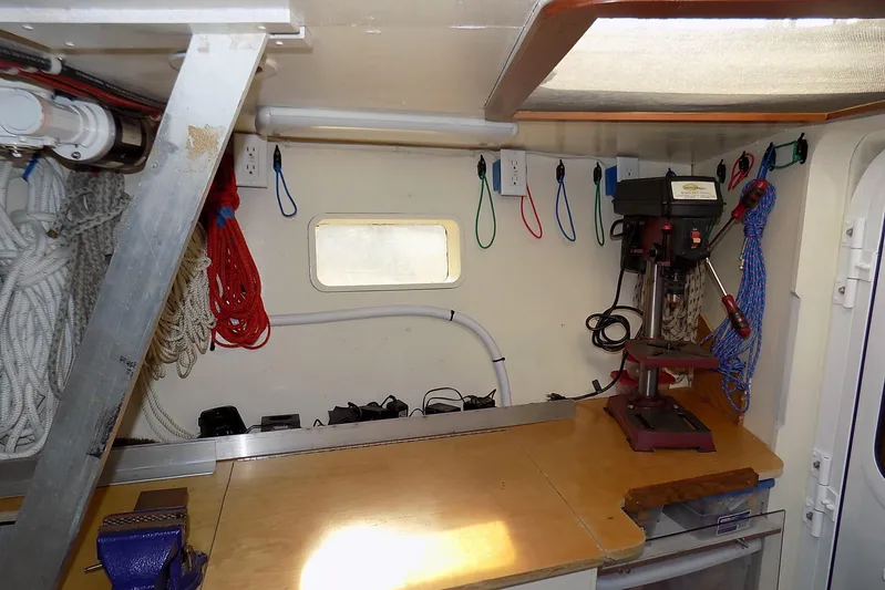  Yacht Photos Pics Workshop interior of 2014 Custom Aluminum Expedition with tools and ropes organized neatly.