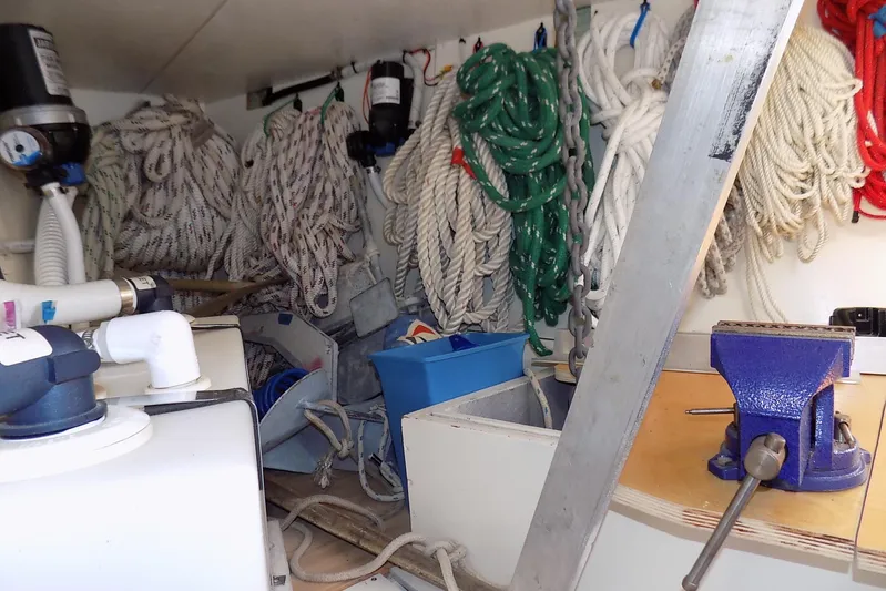  Yacht Photos Pics Storage area with ropes, tools, and equipment on a 2014 Custom Aluminum Expedition boat.