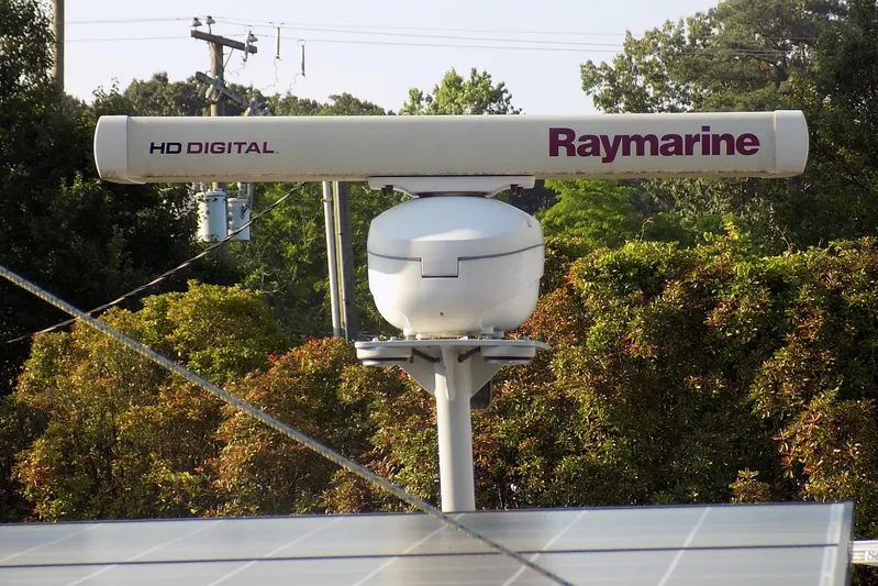  Yacht Photos Pics Raymarine HD Digital radar on 2014 Custom Aluminum Expedition, surrounded by greenery.