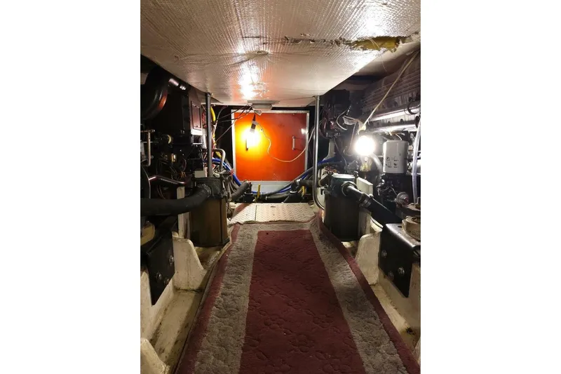  Yacht Photos Pics Engine room of 1991 Bayliner 4588 Pilothouse with visible machinery and lighting.