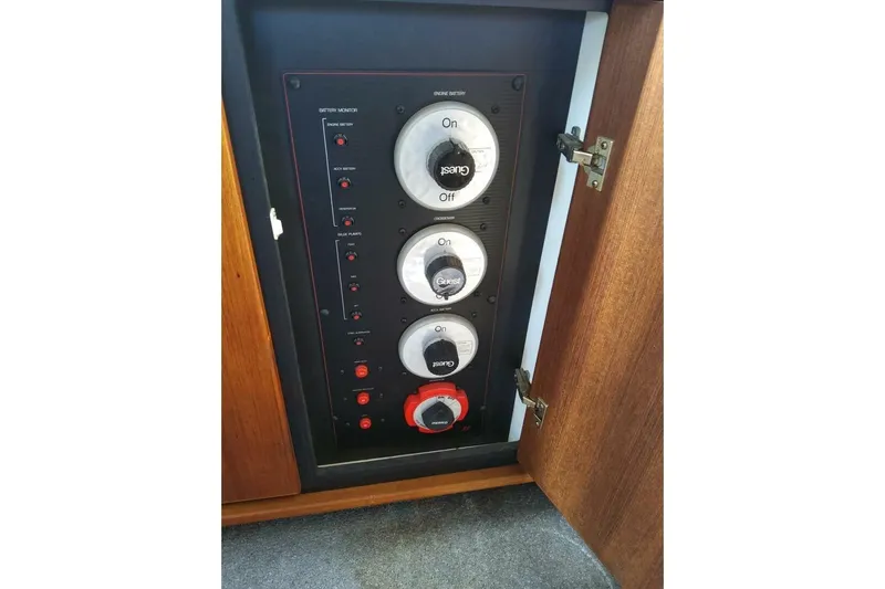  Yacht Photos Pics 1991 Bayliner 4588 Pilothouse battery control panel with switches and indicators.