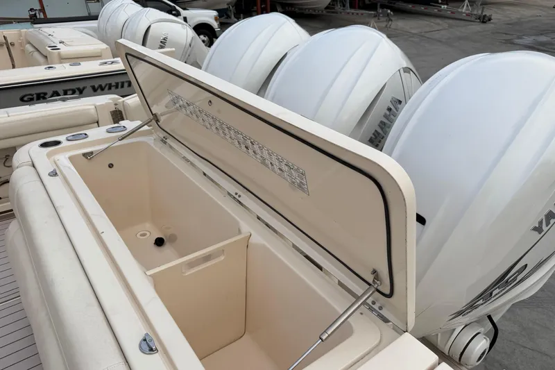 336-420 Brokerage Tyler Yacht Photos Pics 2020 Grady-White Canyon 336 boat with open storage compartment and Yamaha engines.