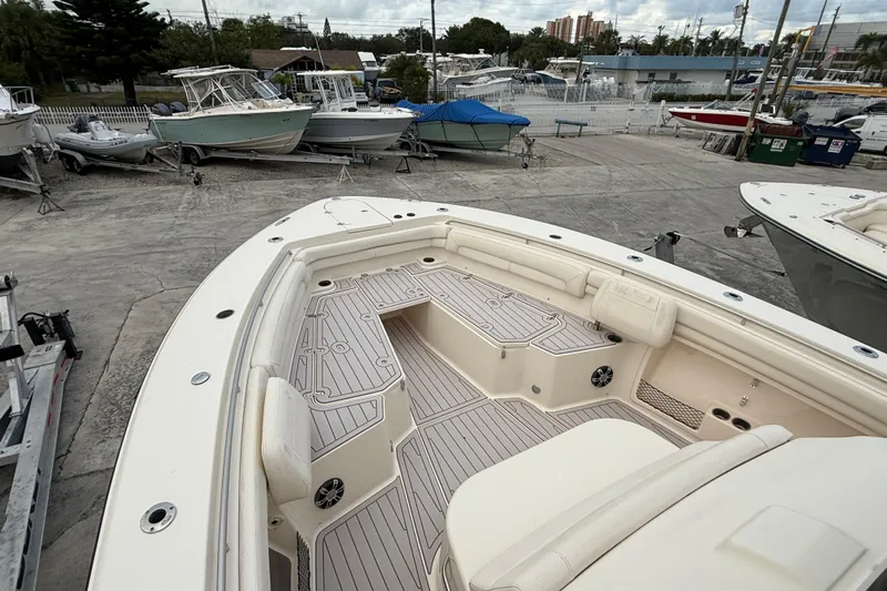 336-420 Brokerage Tyler Yacht Photos Pics 2020 Grady-White Canyon 336 boat interior with spacious seating and deck layout.