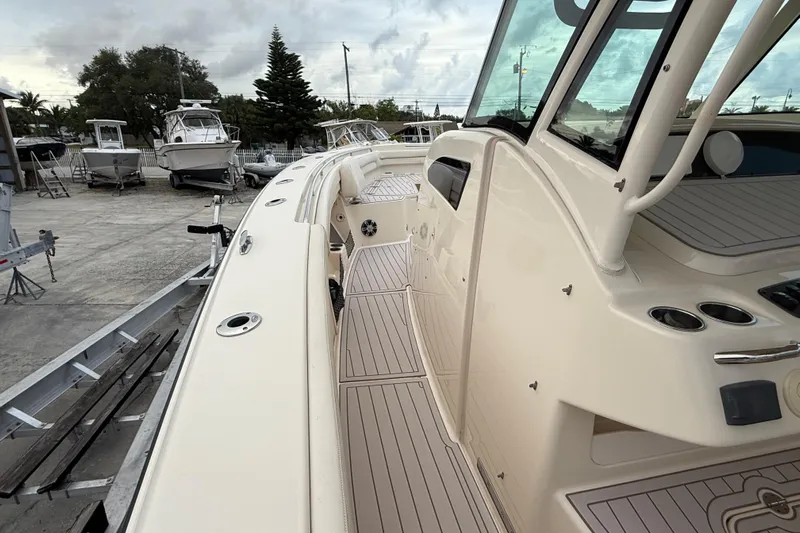 336-420 Brokerage Tyler Yacht Photos Pics 2020 Grady-White Canyon 336 boat docked, showcasing sleek design and spacious deck.