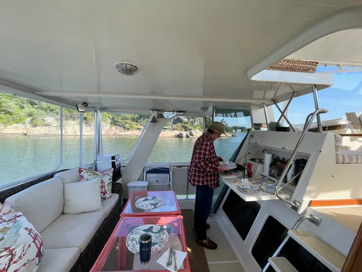 At Last Yacht Photos Pics Preparing Breakfast on the Sundeck