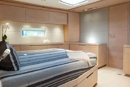 Thalima Yacht Photos Pics Luxurious Southern Wind SW110 2010 yacht bedroom with modern design and natural light.