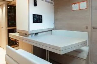 Thalima Yacht Photos Pics Interior of 2010 Southern Wind SW110 yacht with modern seating and control panel.