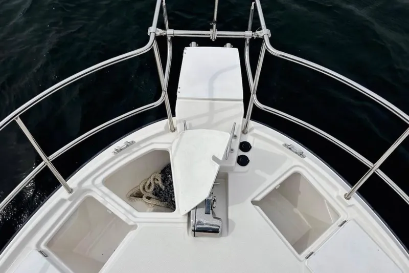 Flips Ahoy Yacht Photos Pics Bow of 2021 Ranger Tugs R-29 S with anchor and storage compartments.