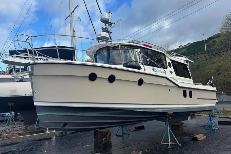 Flips Ahoy Yacht Photos Pics 2021 Ranger Tugs R-29 S boat on stands, ready for maintenance.