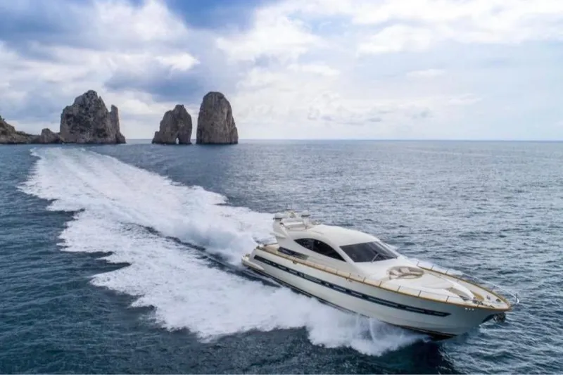  Yacht Photos Pics Luxury yacht Cerri Cantieri Navali 86 Flying Sport cruising near rocky coastline, 2005 model.