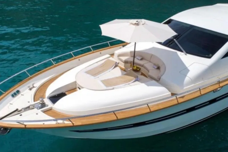  Yacht Photos Pics Luxury yacht Cerri Cantieri Navali 86 Flying Sport 2005 on serene blue water.