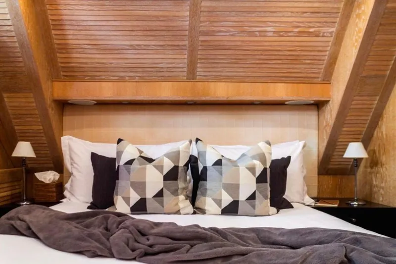  Yacht Photos Pics Luxurious bedroom with geometric pillows on Cerri Cantieri Navali 86 Flying Sport yacht, 2005.