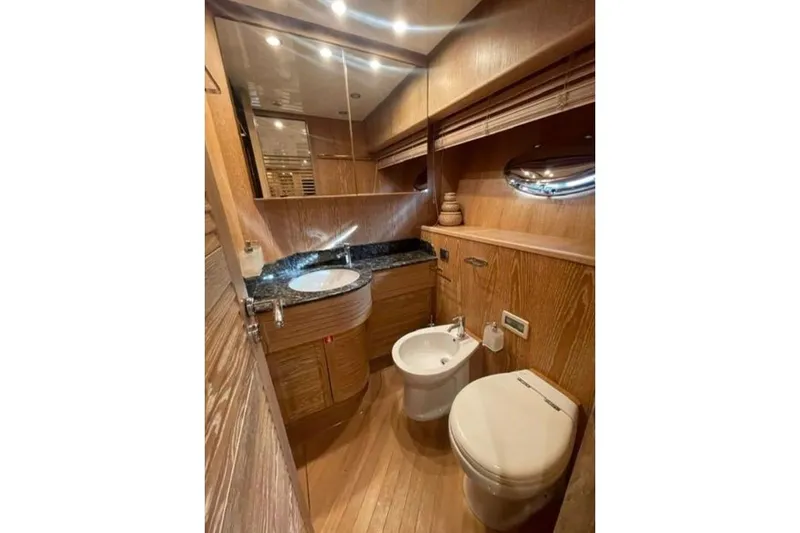  Yacht Photos Pics Luxurious wooden bathroom interior on 2005 Cerri Cantieri Navali 86 Flying Sport yacht.