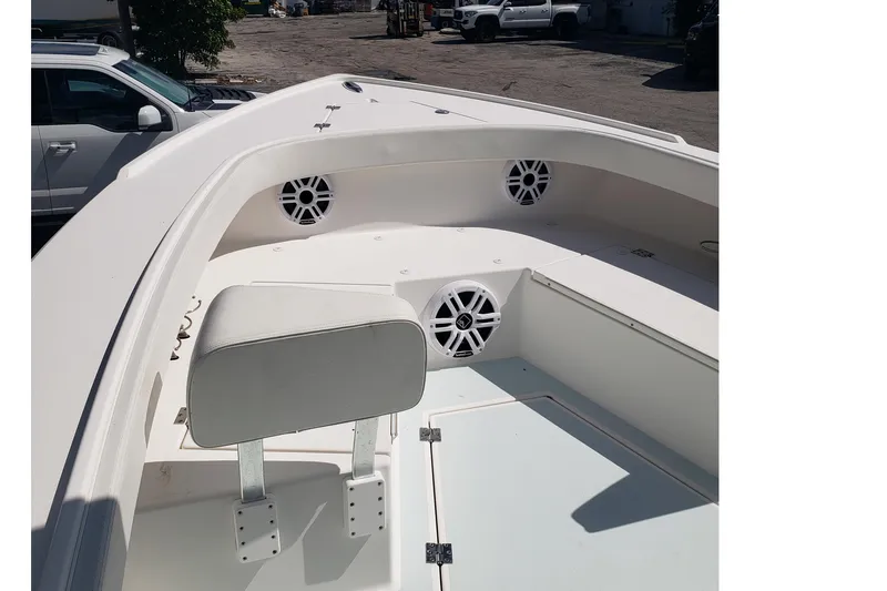 27 Albury Brothers Yacht Photos Pics 2022 Albury Brothers 27 boat interior with seating and speakers.